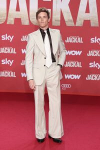 Eddie Redmayne Wore Tiger of Sweden To 'The Day Of The Jackal' Berlin Premiere