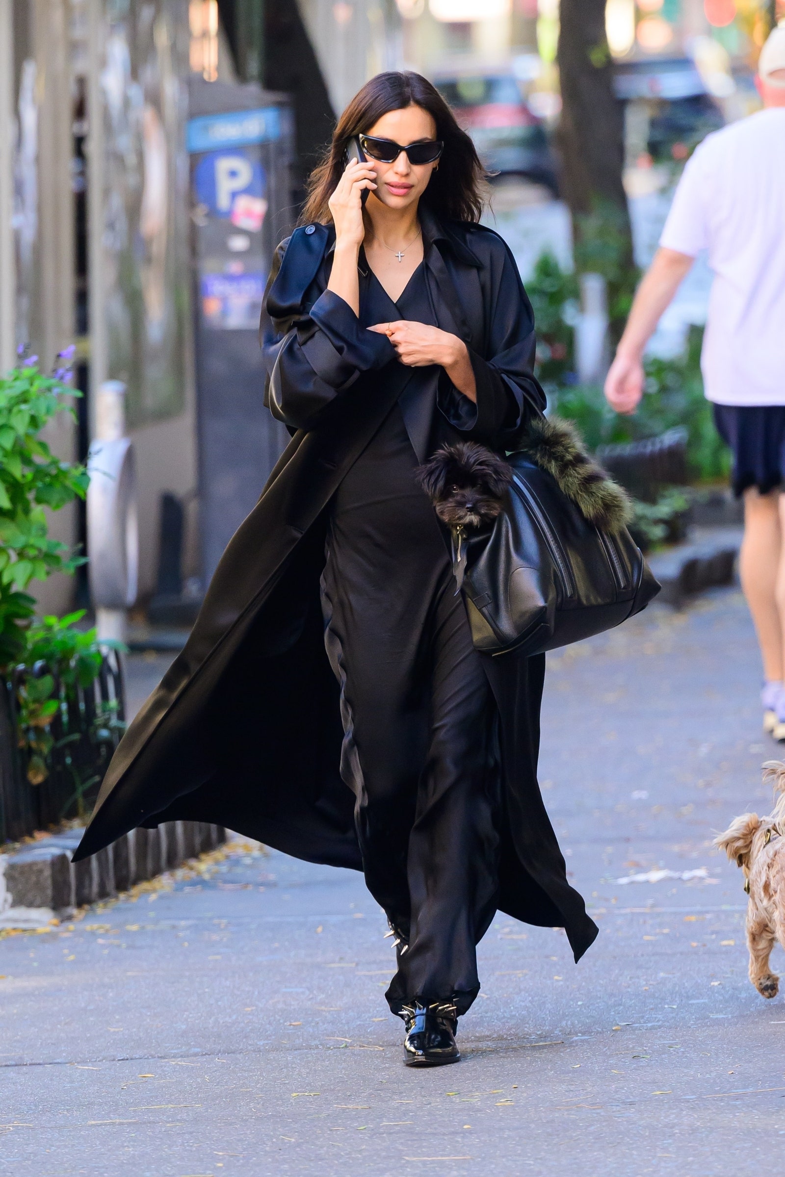 Image may contain Irina Shayk Pedestrian Person Adult Accessories Bag Handbag Clothing Footwear Shoe and Glasses