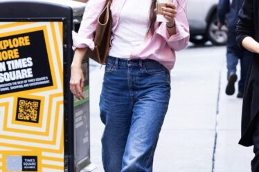 Katie Holmes was seen taking a casual walk through New York City, carrying her stylish KHAITE bag.