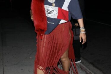 Photo Â© 2024 Backgrid/The Grosby Group
EXCLUSIVE 
West Hollywood, November 13, 2024
Rihanna turned heads at The Nice Guy in West Hollywood, rocking a skin-baring dress that highlighted her curves, paired with a Martine-Rose shirt featuring her son's name "Riot". The singer turned businesswoman effortlessly blended sultry style with a personal touch -- proving once again she's the ultimate fashion risk-taker.