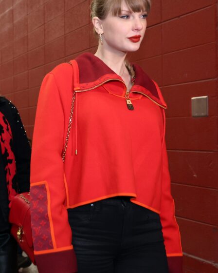 Image may contain Taylor Swift Blouse Clothing Coat Jacket Adult Person Long Sleeve Sleeve Accessories and Bag