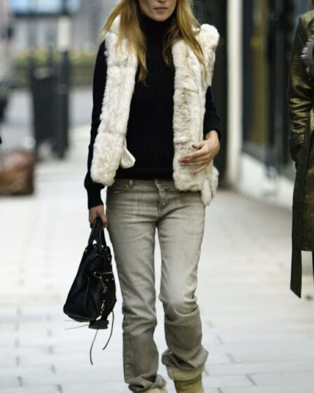 Image may contain Kate Moss Clothing Pants Jeans Coat Jacket Accessories Bag Handbag Adult Person and Footwear