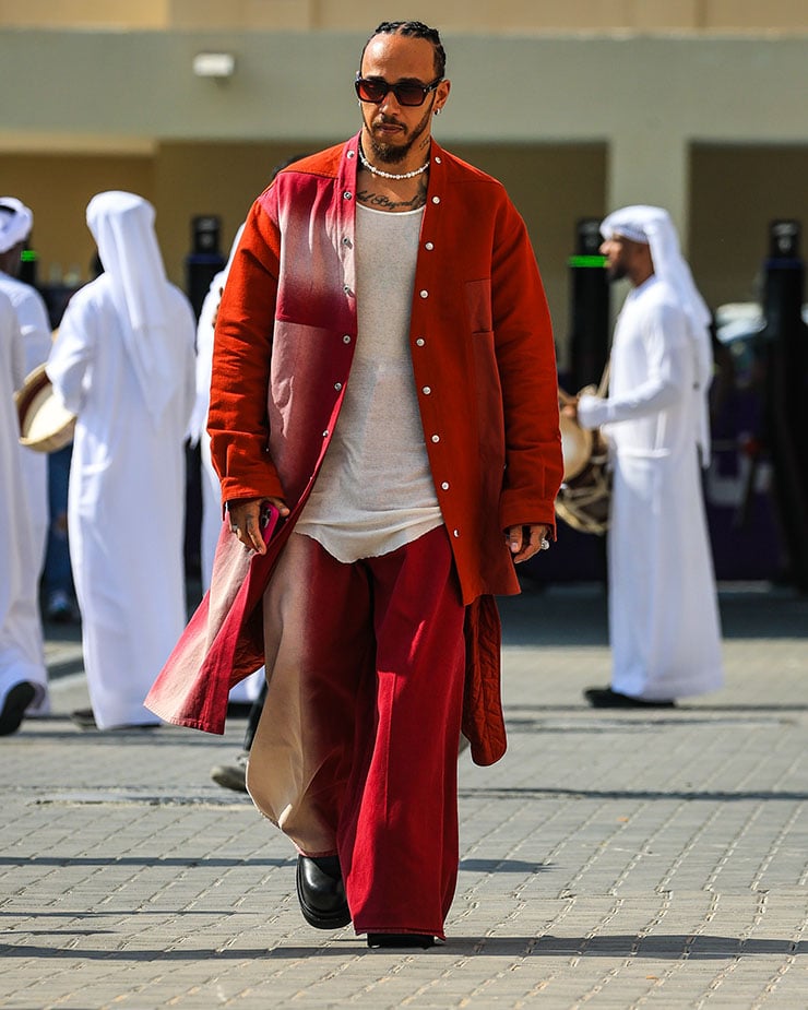 Lewis Hamilton of Great Britain and Mercedes walks in the paddock during qualifying ahead of the F1 Grand Prix of Abu Dhabi