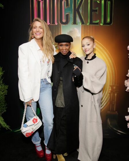 Image may contain Blake Lively Ariana Grande Cynthia Erivo Clothing Coat Pants Jacket Blazer Accessories and Bag