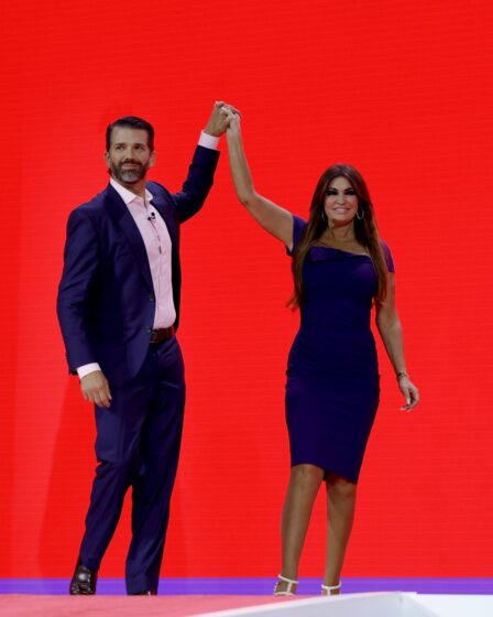 Image may contain Donald Trump Jr. Kimberly Guilfoyle Head Person Face Happy Adult Clothing Footwear and Shoe