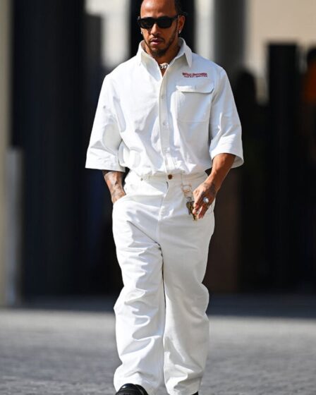 Lewis Hamilton of Great Britain and Mercedes walks in the Paddock during previews ahead of the F1 Grand Prix of Abu Dhabi