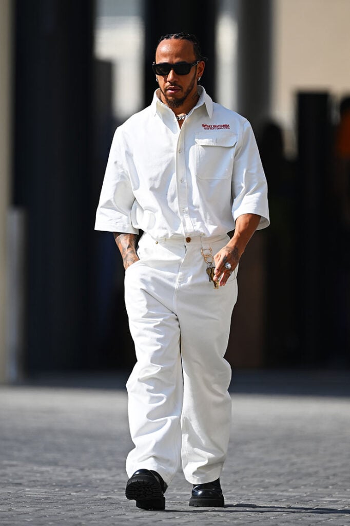 Lewis Hamilton of Great Britain and Mercedes walks in the Paddock during previews ahead of the F1 Grand Prix of Abu Dhabi