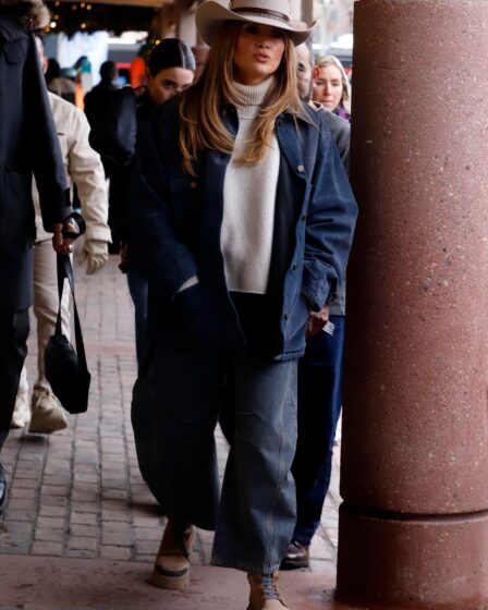 Image may contain Jennifer Lopez Clothing Coat Pants Person Hat Formal Wear Suit Glove Jacket Footwear and Shoe