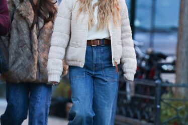 Image may contain Sydney Sweeney Ilenia Lazzarin Clothing Pants Jeans Hat Accessories Glasses Belt and Footwear