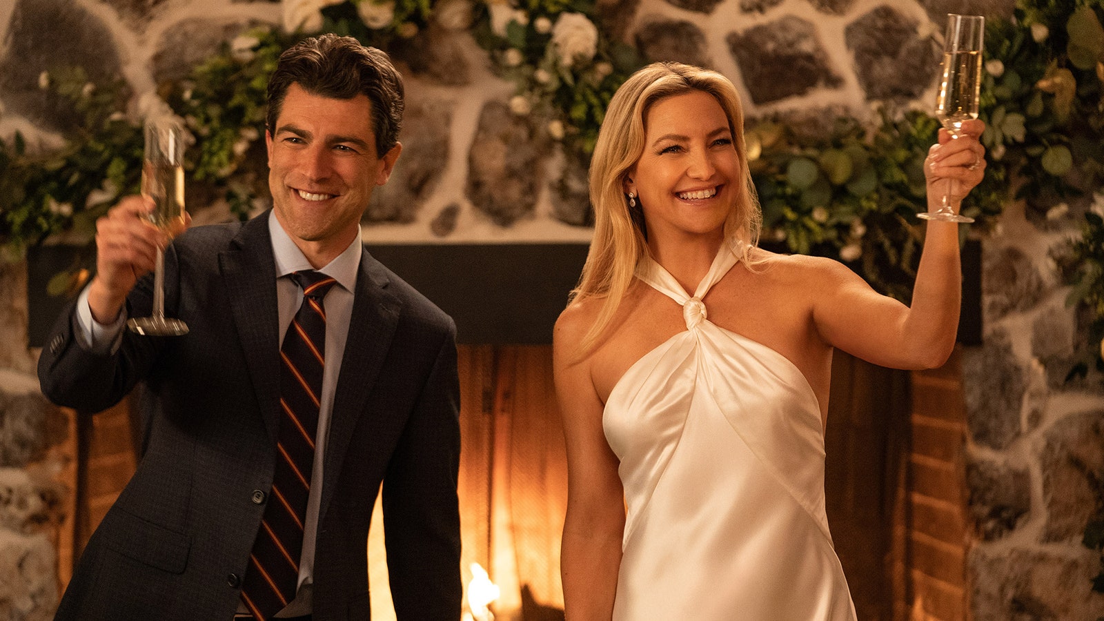 Image may contain Max Greenfield Kate Hudson Accessories Formal Wear Tie Adult Person Clothing Suit Head and Face