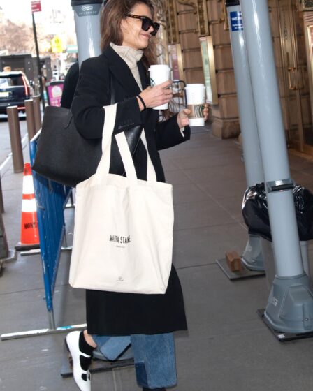 Image may contain Katie Holmes Accessories Glasses Clothing Footwear Shoe Bag Handbag Face Head Person and Adult