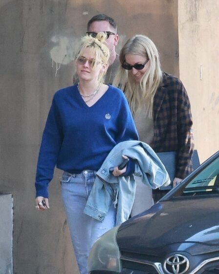 Image may contain Kristen Stewart Clothing Pants Jeans Car Transportation Vehicle Adult Person and Photobombing