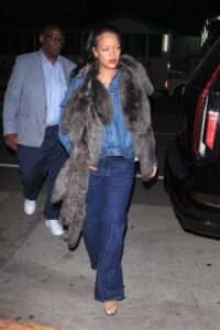 Image may contain Rihanna Reg E. Cathey Clothing Pants Coat Footwear Shoe Sandal Jacket Accessories and Glasses