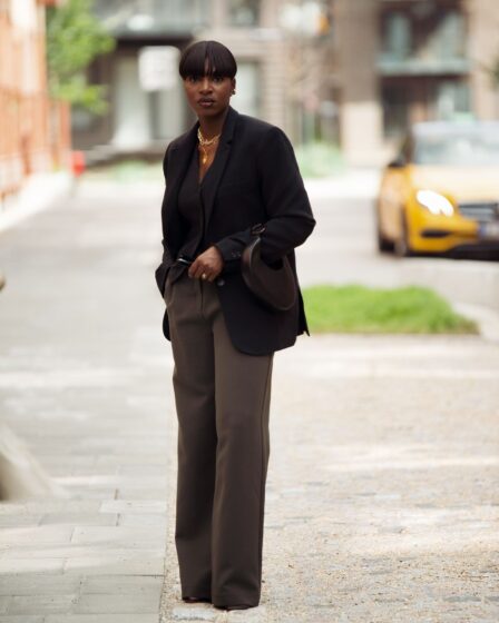 Image may contain Ufuoma Ejenobor Person Standing Clothing Formal Wear Suit Blazer Coat Jacket and Pedestrian